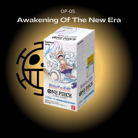 A booster box of One Piece trading cards titled 'Awakening Of The New Era' with Japanese text and artwork featuring characters from the series.